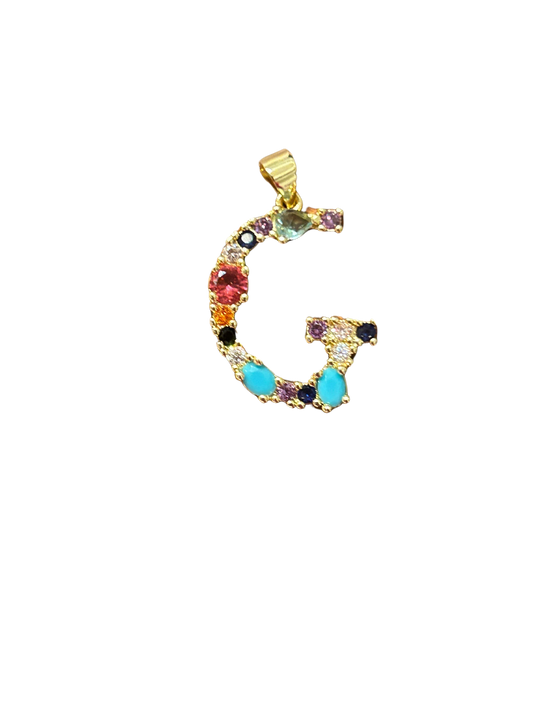 the “G” jeweled pendant