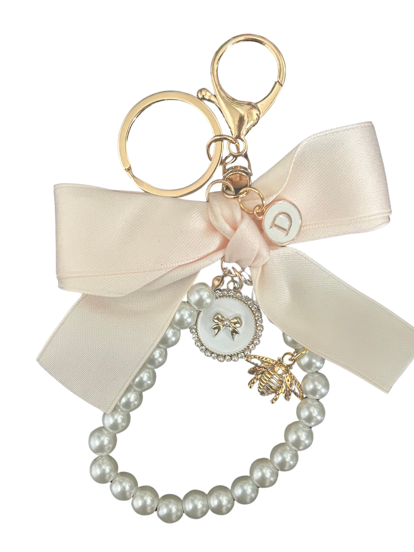 the Bow bag charm [cream]