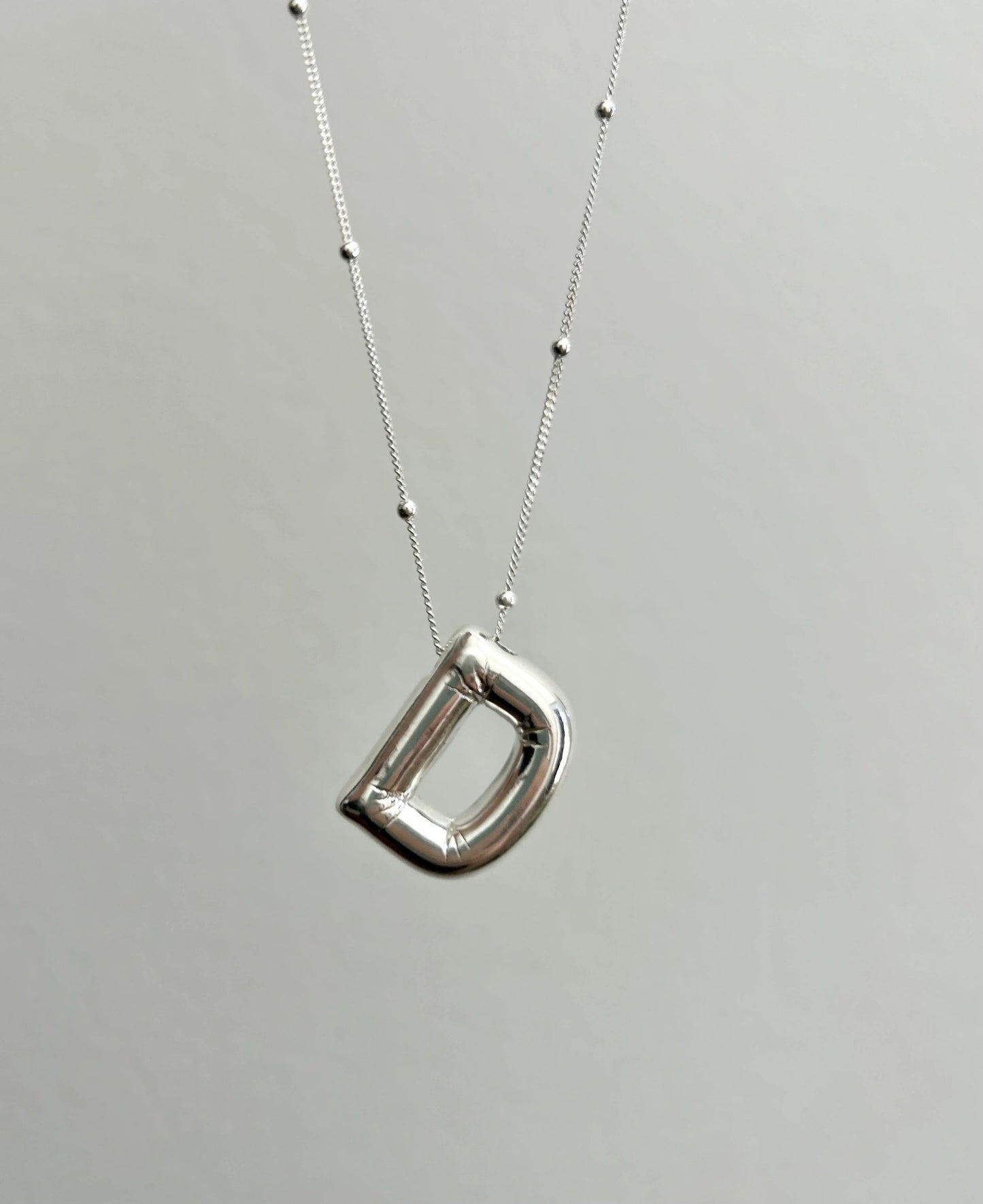 D necklace